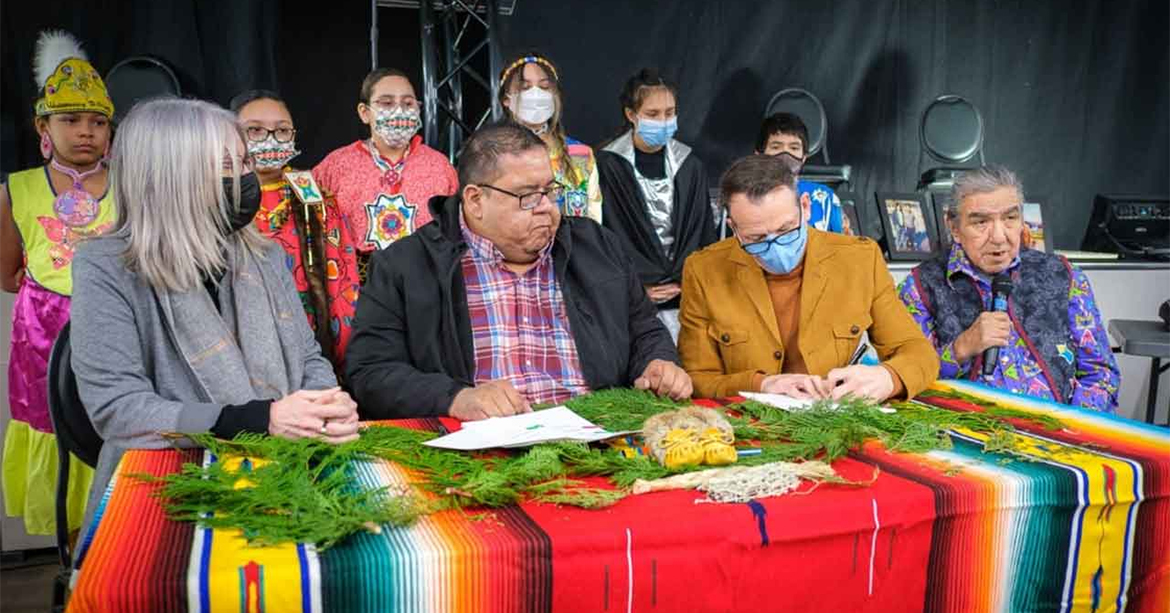 WCWA Agreement signing while WCWA Director Adolphus Cameron speaks on the agreement.